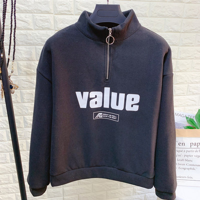 Női blúz pólógallérral, cipzárral és több színben nyomott mintával