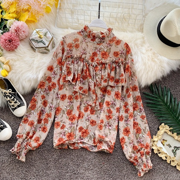 Stílusos női blúz magas gallérral és virágmintával, négy színben