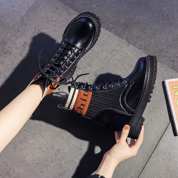 Női téli csizma fűzős öko bőrből, fekete színben