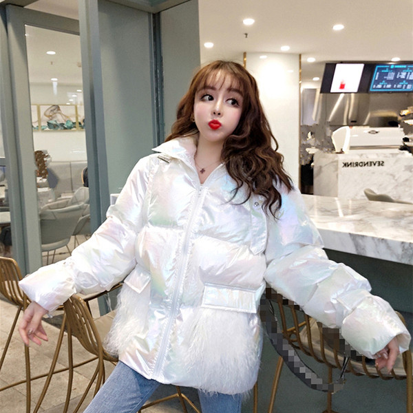 Női téli kabát cipzárral, zsebekkel