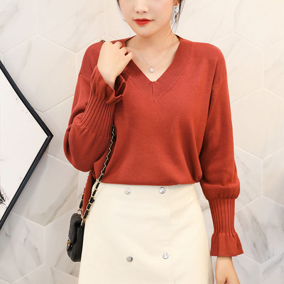 Új modell női pulóver lótusz ujjal és spitz nyakkivágással fehér, fekete, sárga és piros színben