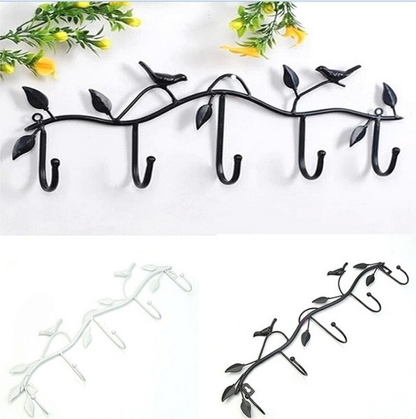 Metal wall hanger in vintage style with birds, leaves and five hooks in black, bronze and white