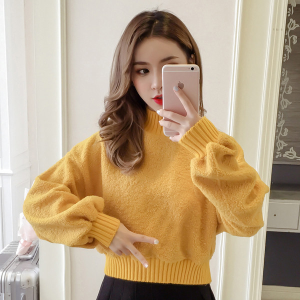 Alkalmi női pulóver négy színben, széles ujjakkal