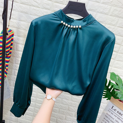 Modern női blúz alacsony gallérral, több színben gyöngyökkel