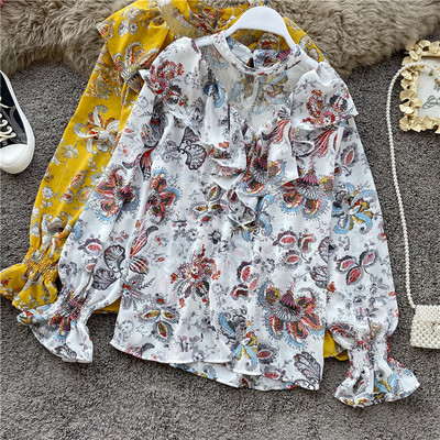 Μοντέρνα γυναικεία μπλούζα με  τύπωμα λουλούδια  και μακριά μανίκια σε ροζ, λευκό και κίτρινο χρώμα