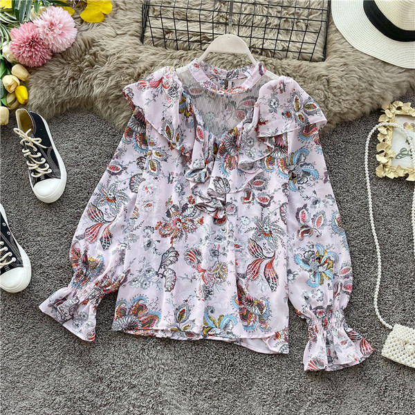 Μοντέρνα γυναικεία μπλούζα με  τύπωμα λουλούδια  και μακριά μανίκια σε ροζ, λευκό και κίτρινο χρώμα