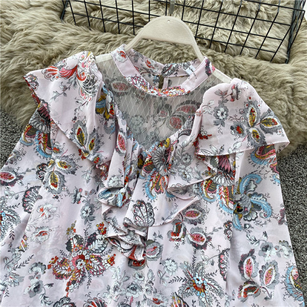 Μοντέρνα γυναικεία μπλούζα με  τύπωμα λουλούδια  και μακριά μανίκια σε ροζ, λευκό και κίτρινο χρώμα