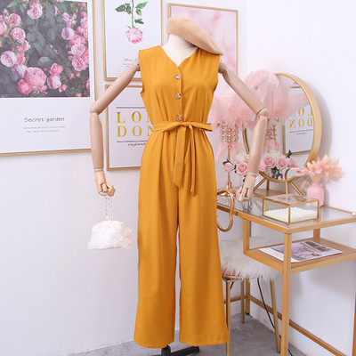 Női overál gombokkal és övvel zöld, sárga, fekete és bordó színben