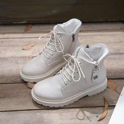 Γυναικείες χειμωνιάτικες έκο δερμάτινες μπότες με ίσια σόλα σε μαύρο και άσπρο χρώμα