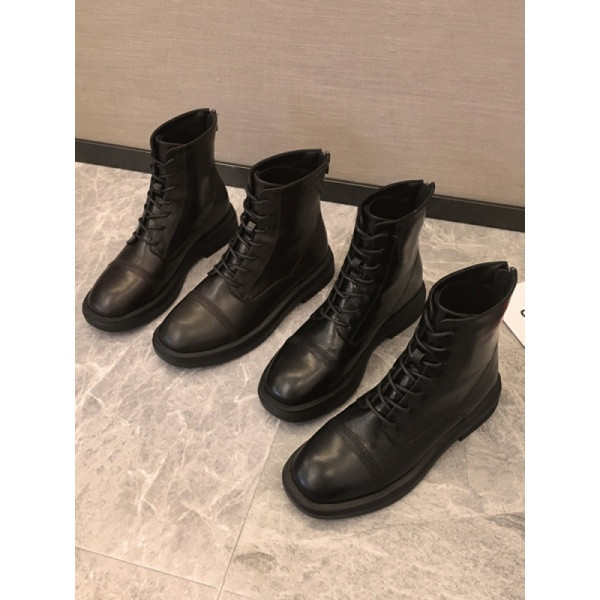 Női alkalmi csizma fűzővel és lekerekített cipzárral