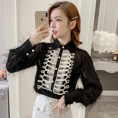 Fekete-fehér női ing, rojtokkal és hosszú ujjal