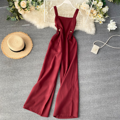 Κομψές γυναικείες ολόσωμες φόρμες με λεπτούς ιμάντες ώμου και φερμουάρ σε μπεζ και κόκκινο χρώμα