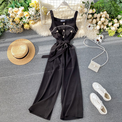 Μοντέρνες γυναικείες ολόσωμες φόρμες με λεπτές λωρίδες και κορδόνια σε λευκό, μαύρο και μπλε χρώμα