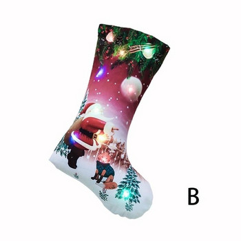 Χριστουγεννιάτικη κάλτσα με φώτα LED σε τέσσερα χρώματα με την εφαρμογή του Άγιου Βασίλη, χιονάνθρωπο και ελάφι