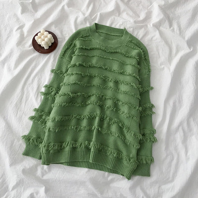 Modern női blúz több színben, bojttal, ovális nyakkivágással