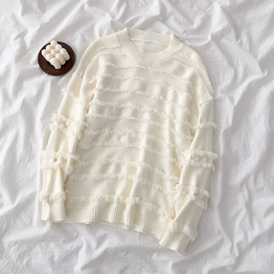 Modern női blúz több színben, bojttal, ovális nyakkivágással