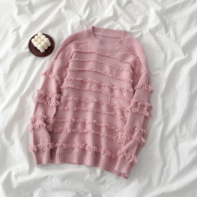 Modern női blúz több színben, bojttal, ovális nyakkivágással