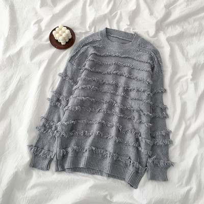 Modern női blúz több színben, bojttal, ovális nyakkivágással