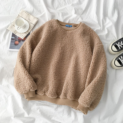 Fehér és barna színű női pulóver ovális nyakkivágással és hosszú ujjal