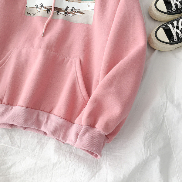 Γυναικείο casual πουλόβερ σε τρία χρώματα με εφαρμογή και τσέπη