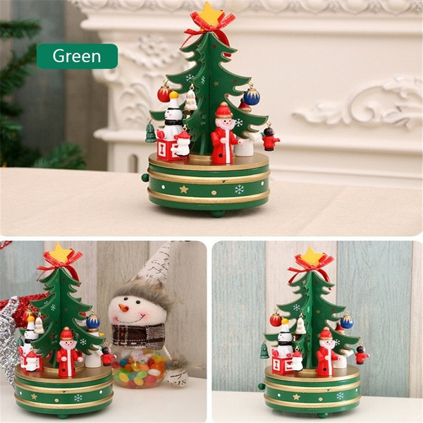 Ξύλινο περιστρεφόμενο μουσικό κουτί σε σχήμα χριστουγεννιάτικου δέντρου σε κόκκινο και πράσινο χρώμα