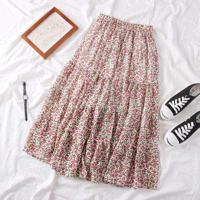 Lezser női szabású szoknya virágos motívumokkal, bézs, kék és lila színekben