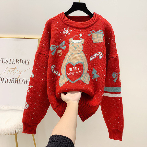 Piros karácsonyi motívumú, modern női pulóver