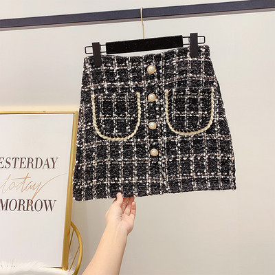 Κομψή καρό φούστα με κουμπιά και ψηλή μέση με τσέπες