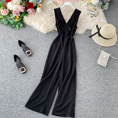 Μοντέρνα μακρύ γυναικεία ολόσωμη φόρμα με ανοιχτό ντεκολτέ σε διάφορα χρώματα