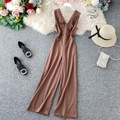 Μοντέρνα μακρύ γυναικεία ολόσωμη φόρμα με ανοιχτό ντεκολτέ σε διάφορα χρώματα