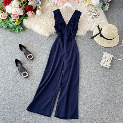 Μοντέρνα μακρύ γυναικεία ολόσωμη φόρμα με ανοιχτό ντεκολτέ σε διάφορα χρώματα