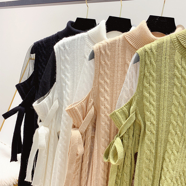 Női pulóver magas gallérral és hálóval a vállán fehér, bézs, zöld és fekete színben