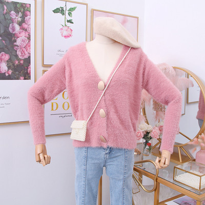 Női kardigán gombokkal és spitz nyakkivágással fehér, fekete, zöld, rózsaszín és bézs színben