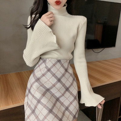 Női kötött pulóver lótusz ujjal és magas gallérral több színben