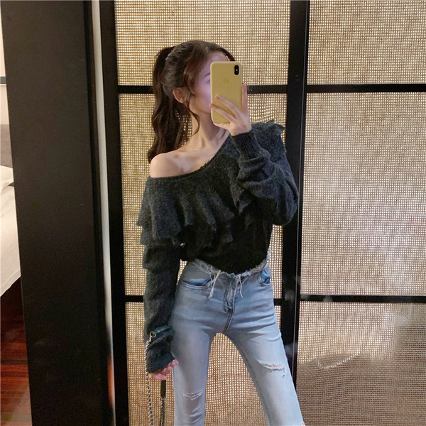 Új modellű női pulóver O-nyakkal, szürke színben