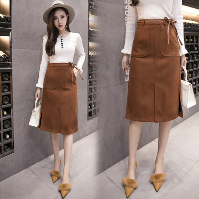 Női sportos-elegáns szoknya övvel és zsebekkel