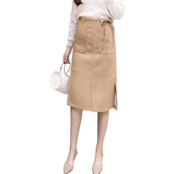 Női sportos-elegáns szoknya övvel és zsebekkel