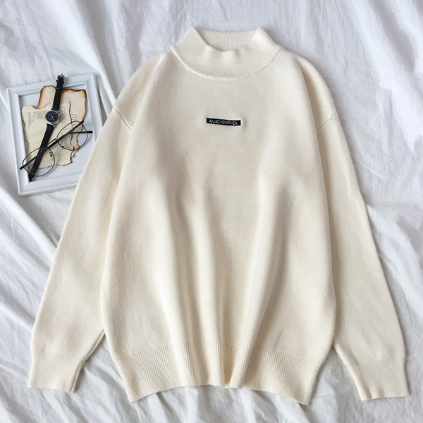 Alkalmi női pulóver felirattal, magas gallérral három színben