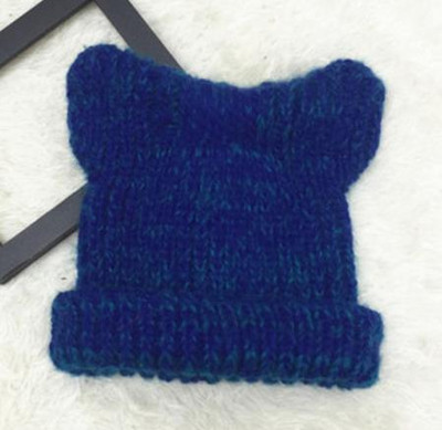 Női téli kötött sapka 3D elemmel több színben