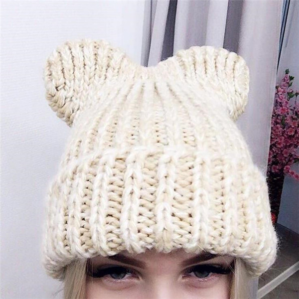 Női téli kötött sapka 3D elemmel több színben