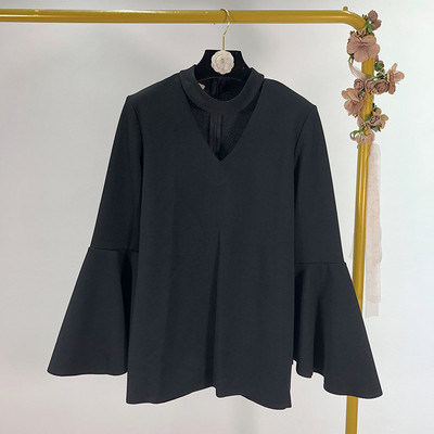 Női blúz széles modell lótusz ujjú fehér és fekete színben