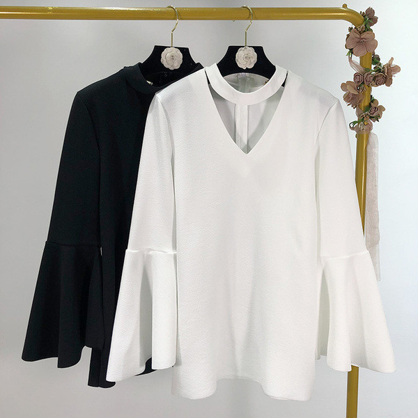 Női blúz széles modell lótusz ujjú fehér és fekete színben