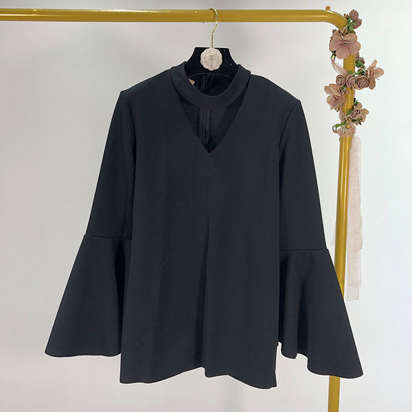 Női blúz széles modell lótusz ujjú fehér és fekete színben