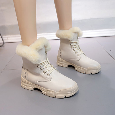 Női téli csizma puha béléssel, fekete-fehér színben