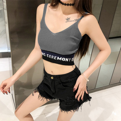 Női sportmelltartó négy színben, felirattal és V-nyakkal