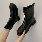 Modern bőrcsizma cipzárral és lapos talppal