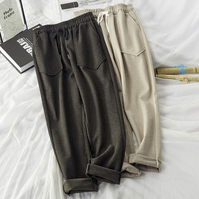 Női alkalmi nadrág gumírozott derékkal és zsebekkel - többféle színben