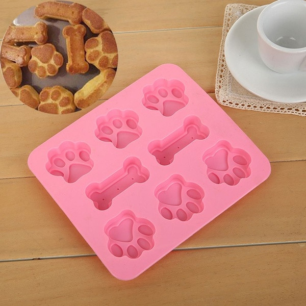 Удобна силиконова форма за печене в розов цвят - лапи и кокали