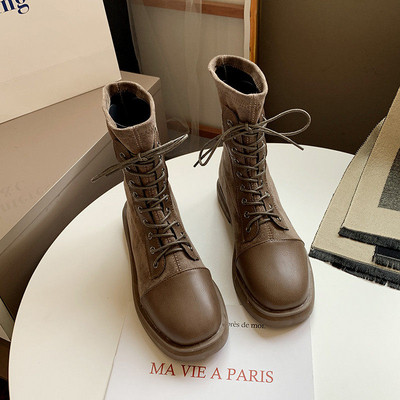 Bézs és fekete színű, fűzős női őszi csizma