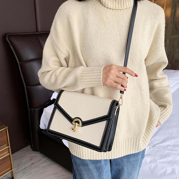 Geanta de dama cu element metalic cu maner lung